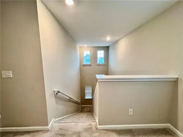 a view of room with window and closet