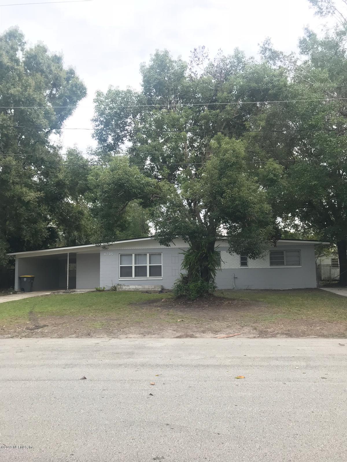 4705 Ruckner Road Jacksonville, FL 32207 - Photo 1 of 24 a view of a house with a yard