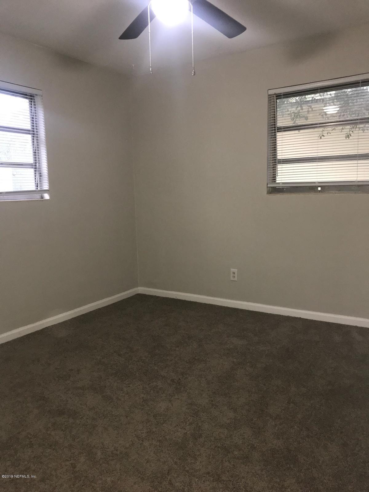 4705 Ruckner Road Jacksonville, FL 32207 - Photo 15 of 24 an empty room with a window