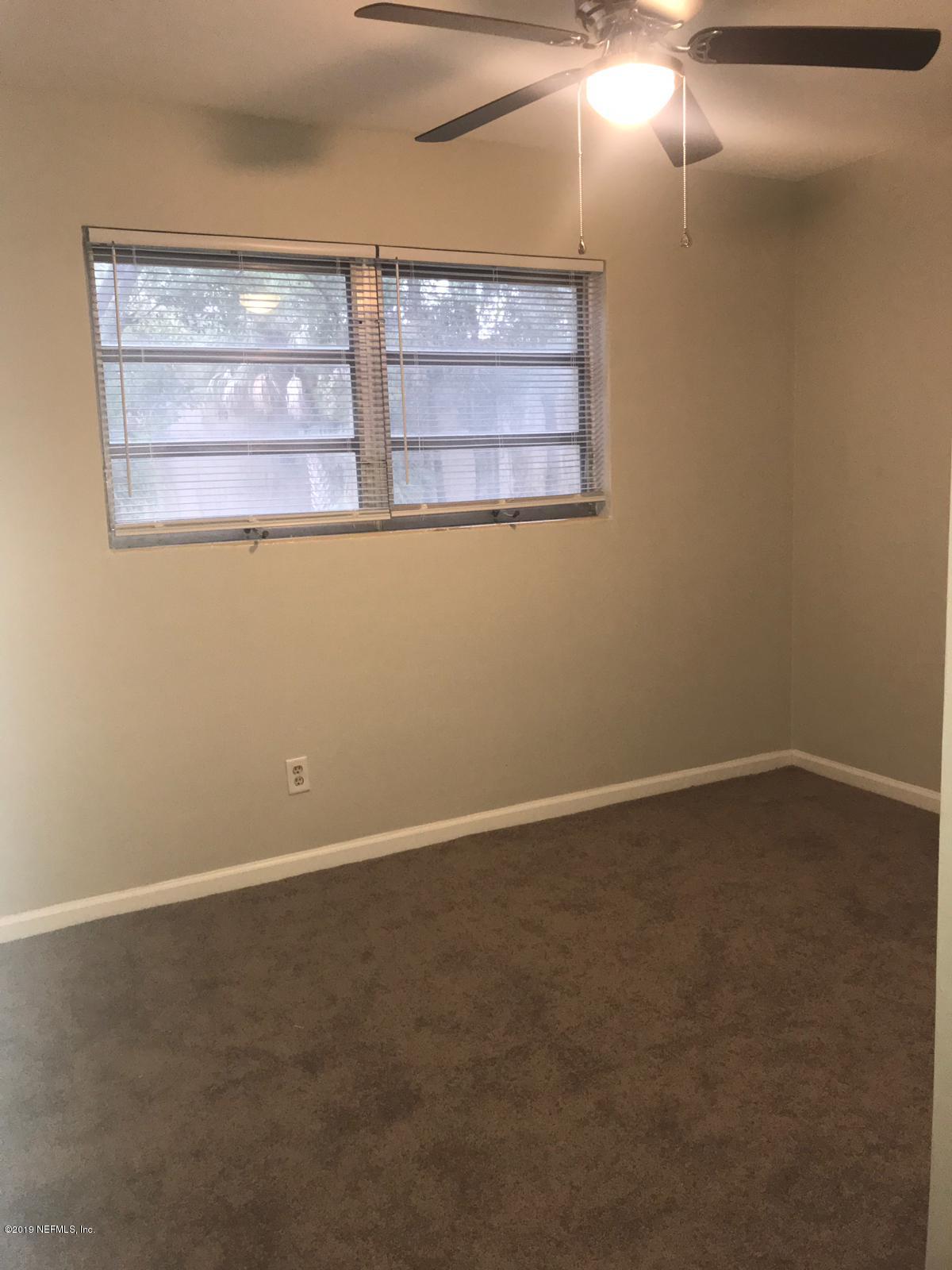4705 Ruckner Road Jacksonville, FL 32207 - Photo 16 of 24 a view of empty room with window