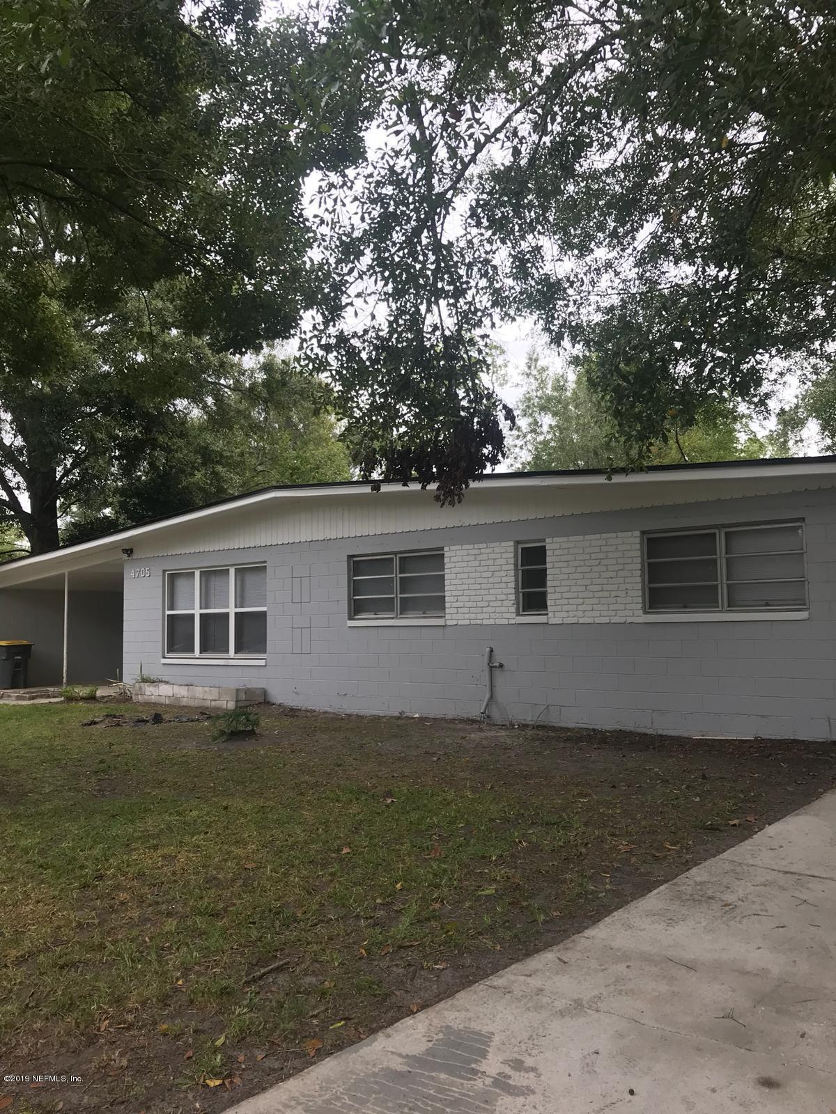 4705 Ruckner Road Jacksonville, FL 32207 - Photo 3 of 24 front view of house with a yard