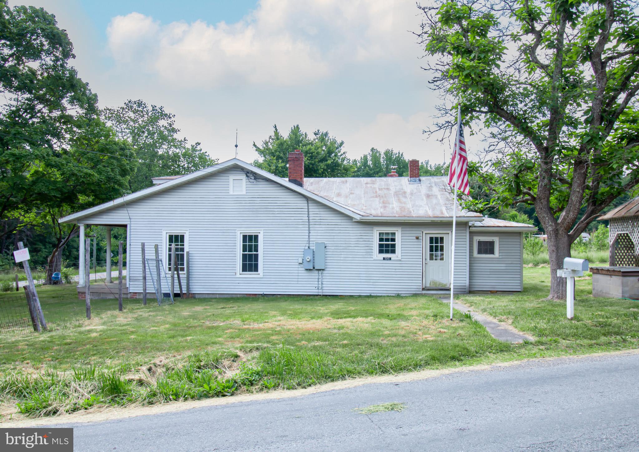 198 Mt Hope Church Road Bumpass, VA 23024 - Photo 7 of 25 front view of a house with a yard