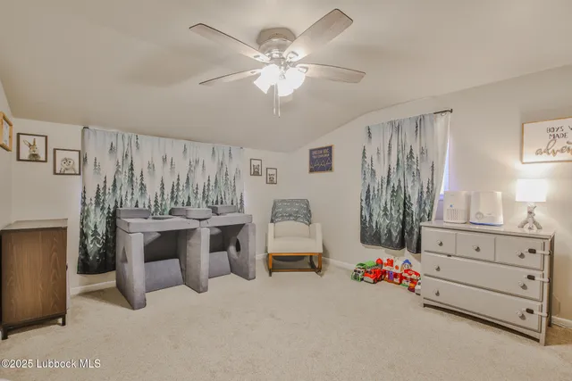 a room with furniture and chandelier