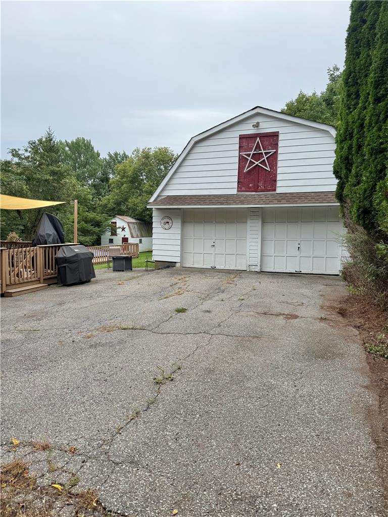 1114 Fox Gap Road Bangor, PA 18013 - Photo 52 of 63 Ample parking on the driveway leads to a classic detached two-car garage.
