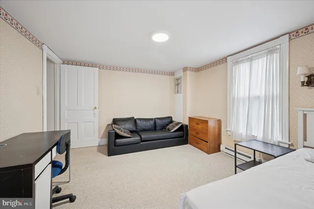 a park view with a wooden bench and trees