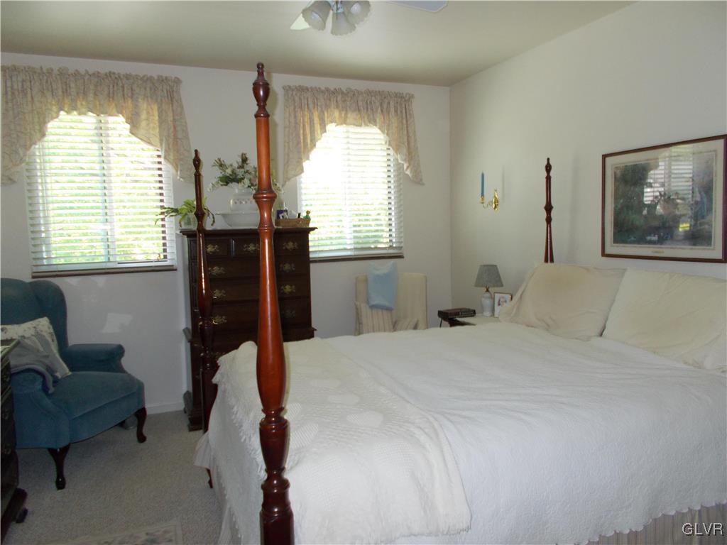 1201 Butztown Road, Unit 16 Bethlehem, PA 18017 - Photo 11 of 11 a bedroom with a bed and furniture