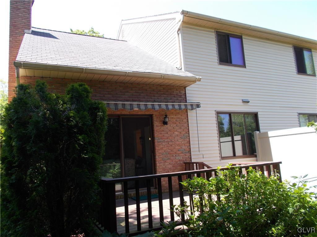 1201 Butztown Road, Unit 16 Bethlehem, PA 18017 - Photo 2 of 11 a front view of a house with glass windows
