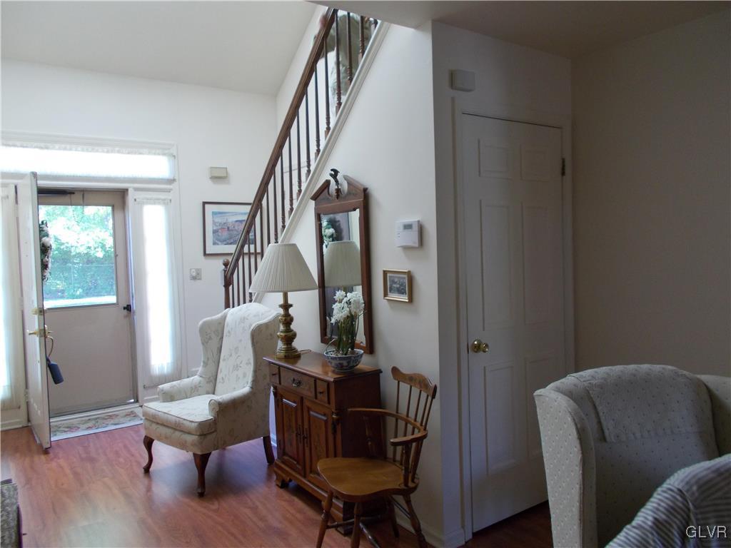 1201 Butztown Road, Unit 16 Bethlehem, PA 18017 - Photo 3 of 11 a view of a livingroom with furniture and hardwood floor