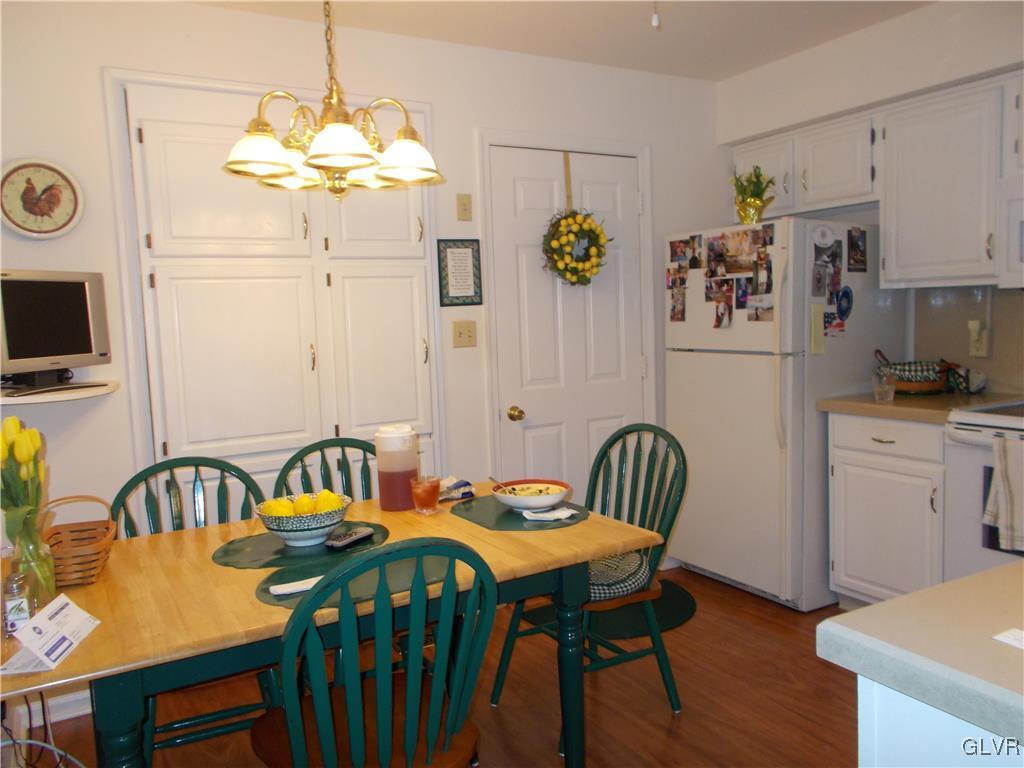 1201 Butztown Road, Unit 16 Bethlehem, PA 18017 - Photo 5 of 11 a view of a dining room with furniture and wooden floor