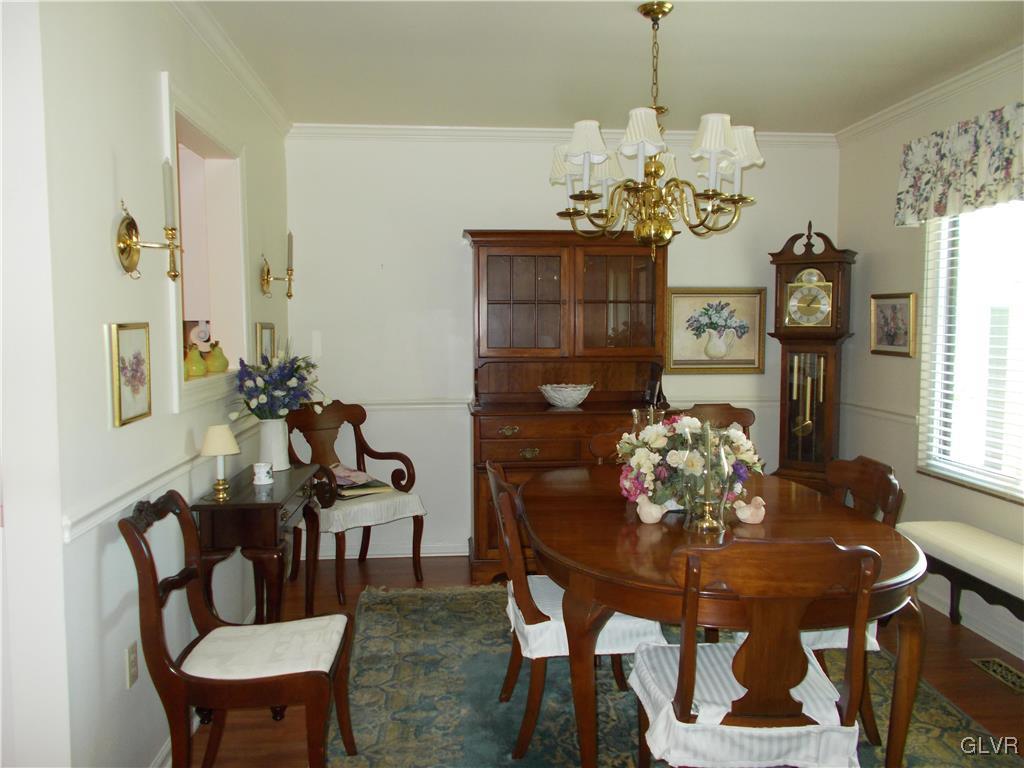 1201 Butztown Road, Unit 16 Bethlehem, PA 18017 - Photo 6 of 11 a view of a dining room with furniture and chandelier