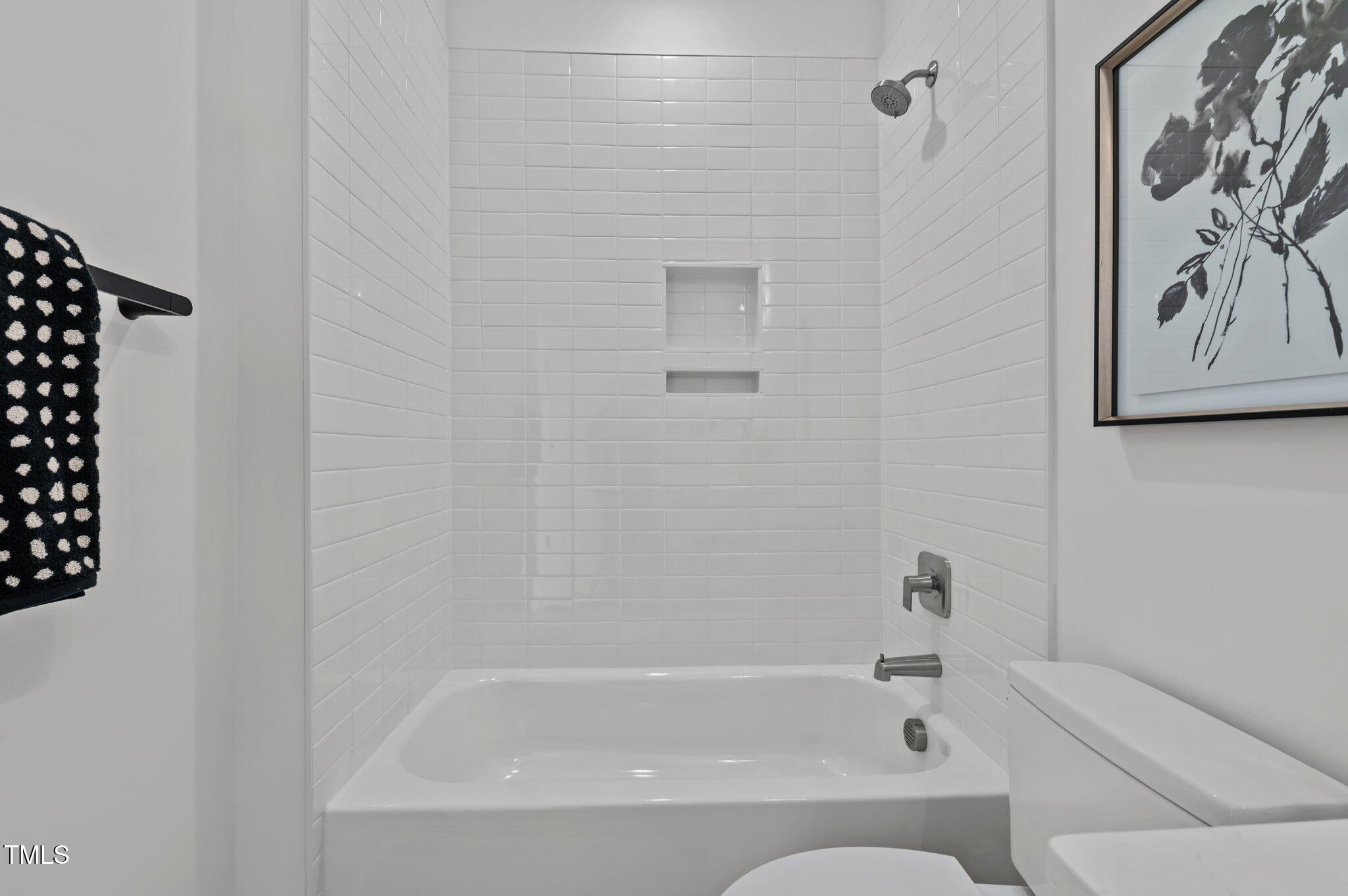 700 West North Street, Unit 101 Raleigh, NC 27603 - Photo 32 of 39 Secondary Bathroom Suites