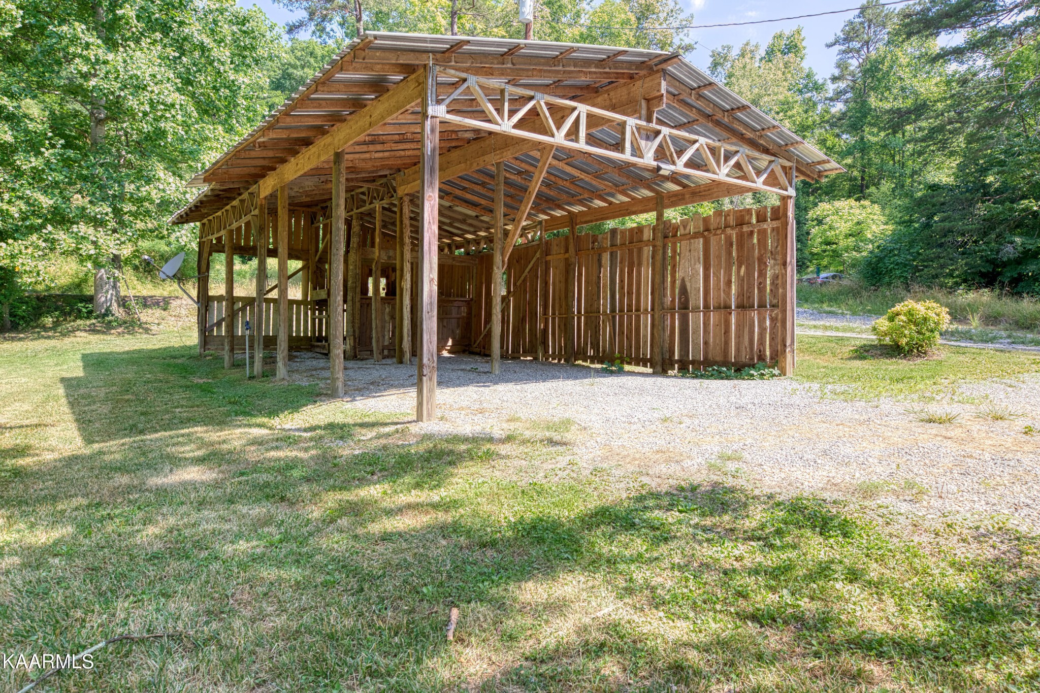 764 Mt Olive Road Andersonville, TN 37705 - Photo 13 of 37 a view of a house with backyard and a patio