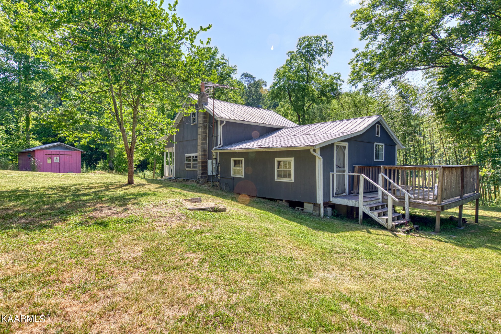 764 Mt Olive Road Andersonville, TN 37705 - Photo 14 of 37 a view of a house with a yard and sitting area