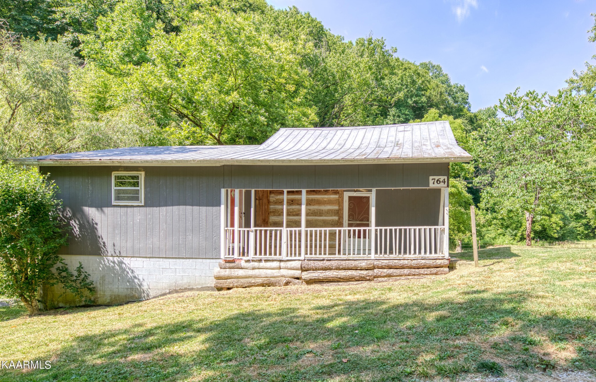 764 Mt Olive Road Andersonville, TN 37705 - Photo 18 of 37 front view of a house with a yard