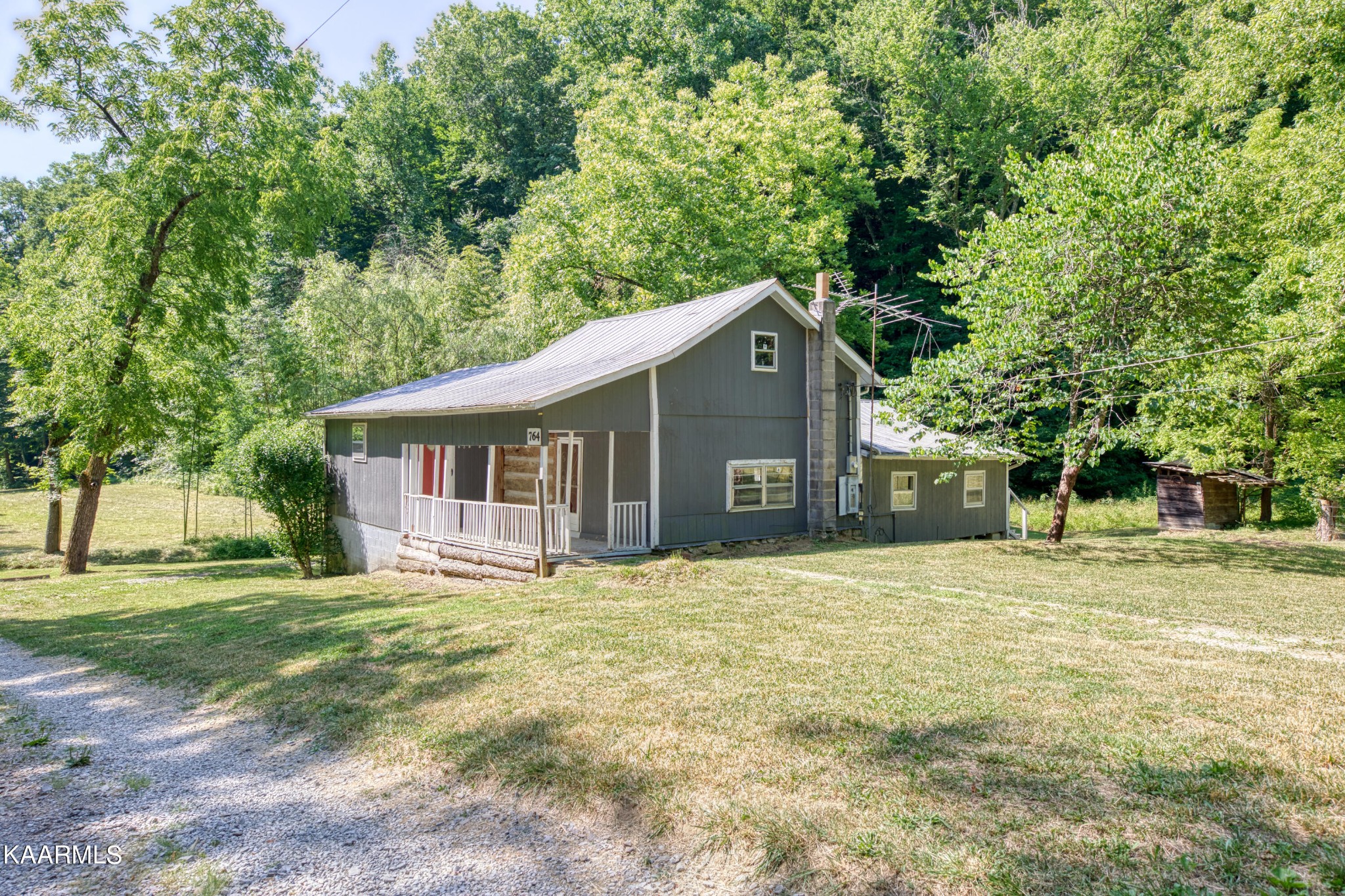 764 Mt Olive Road Andersonville, TN 37705 - Photo 2 of 37 a house that has a big yard