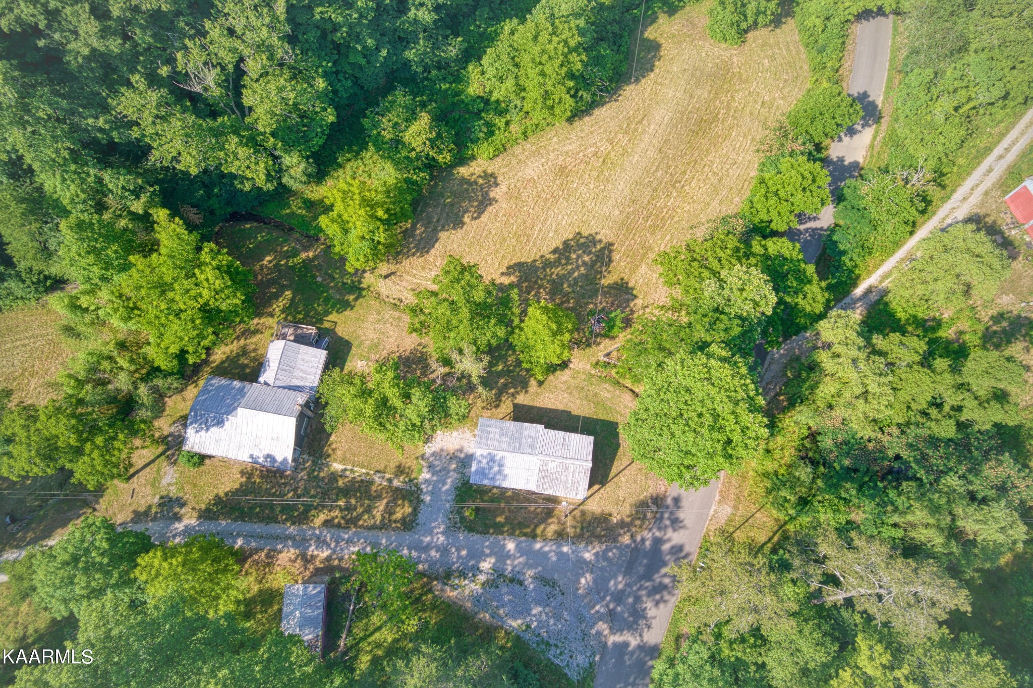 764 Mt Olive Road Andersonville, TN 37705 - Photo 21 of 37 an aerial view of a house with a yard