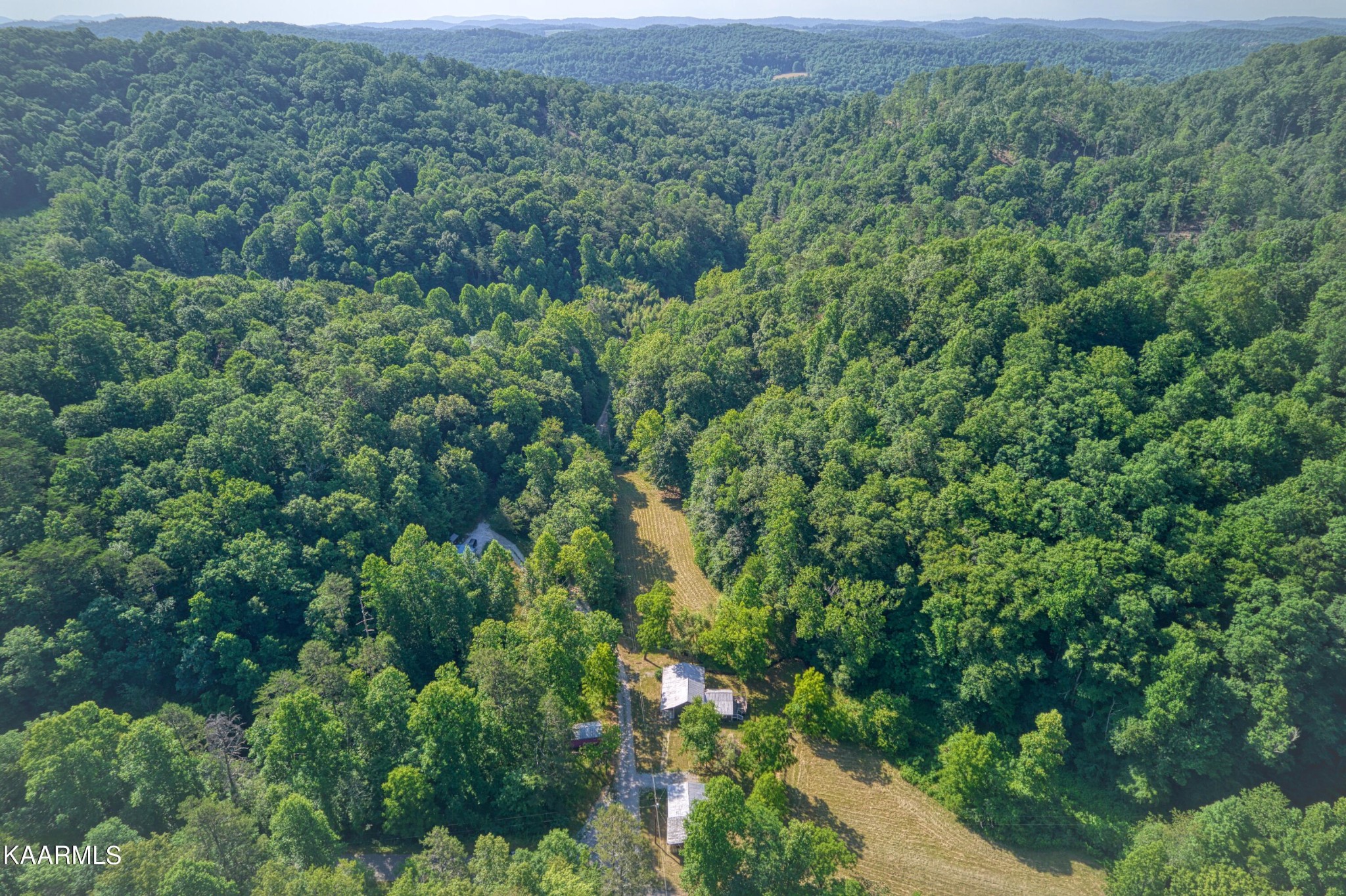 764 Mt Olive Road Andersonville, TN 37705 - Photo 22 of 37 an aerial view of residential house with outdoor space and trees all around