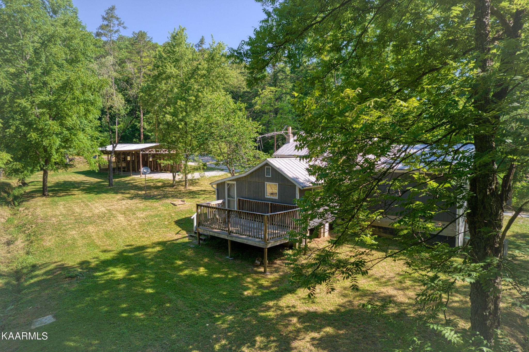 764 Mt Olive Road Andersonville, TN 37705 - Photo 31 of 37 a garden view with a seating space