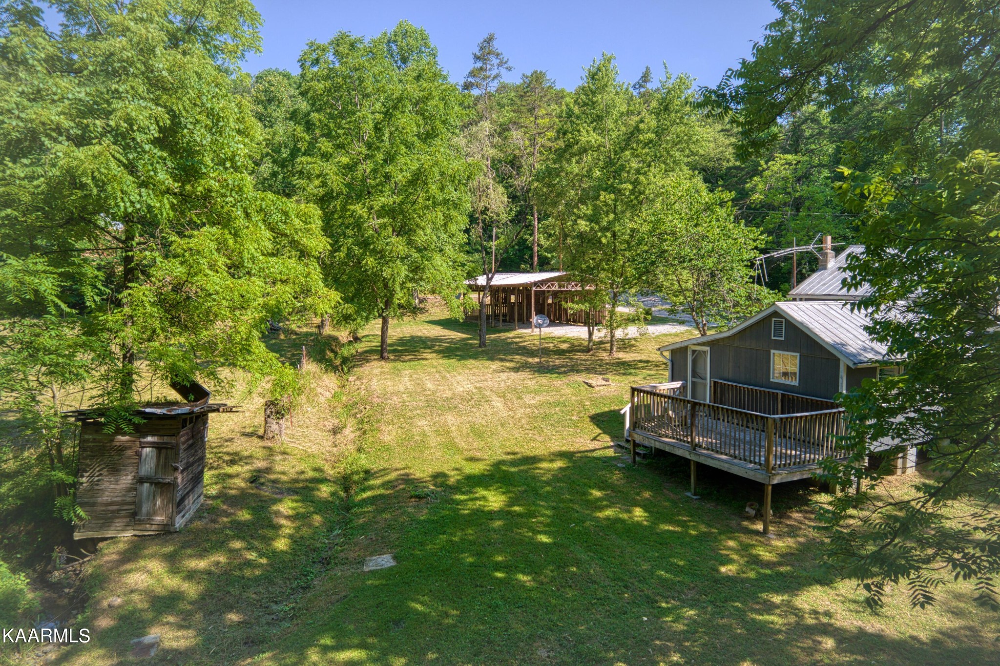 764 Mt Olive Road Andersonville, TN 37705 - Photo 32 of 37 a view of a house with a yard
