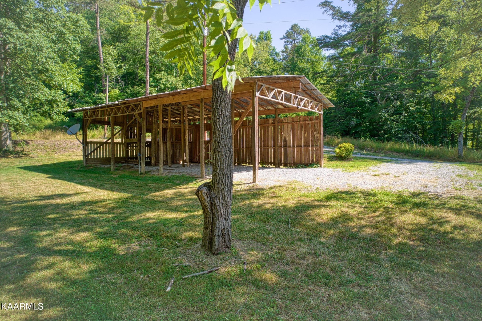 764 Mt Olive Road Andersonville, TN 37705 - Photo 36 of 37 a backyard of a house with lots of green space