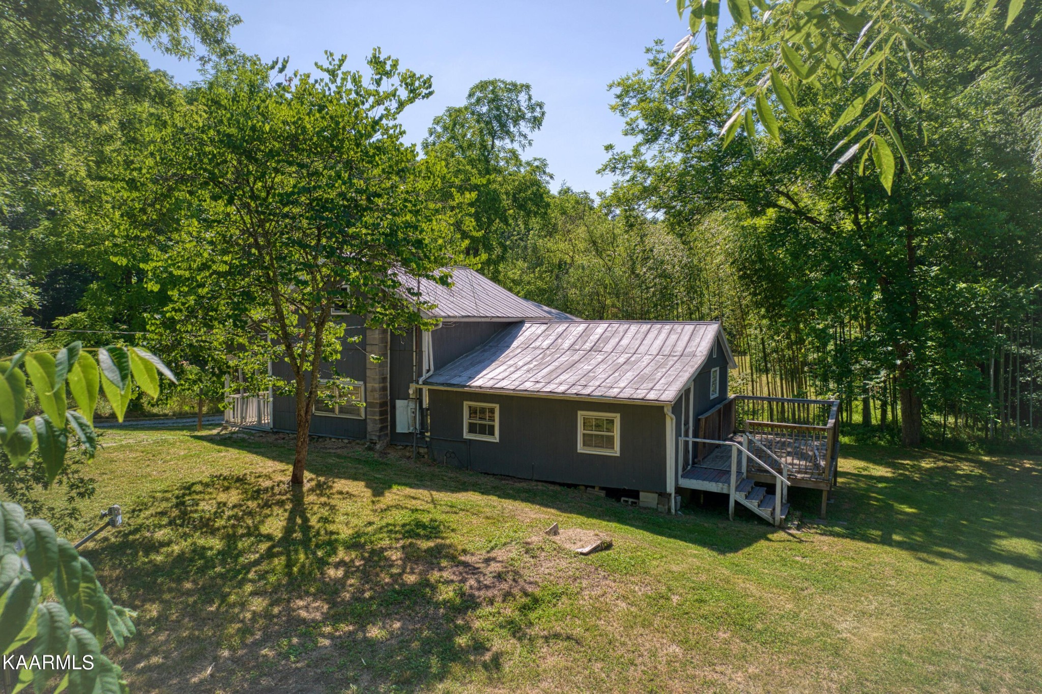 764 Mt Olive Road Andersonville, TN 37705 - Photo 37 of 37 a view of a house with a yard