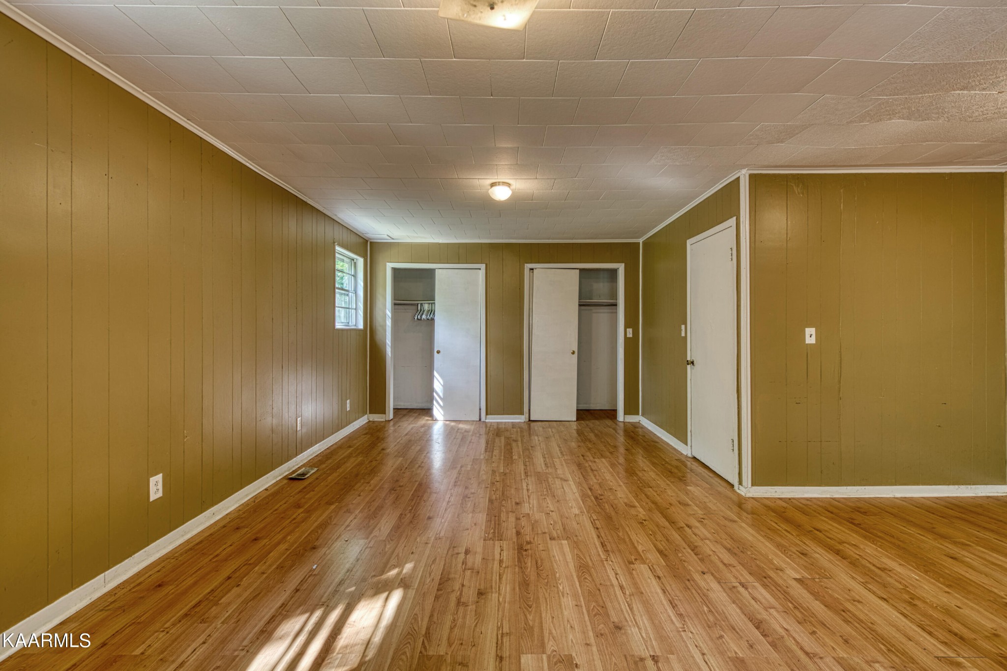 764 Mt Olive Road Andersonville, TN 37705 - Photo 5 of 37 a view of an empty room with wooden floor