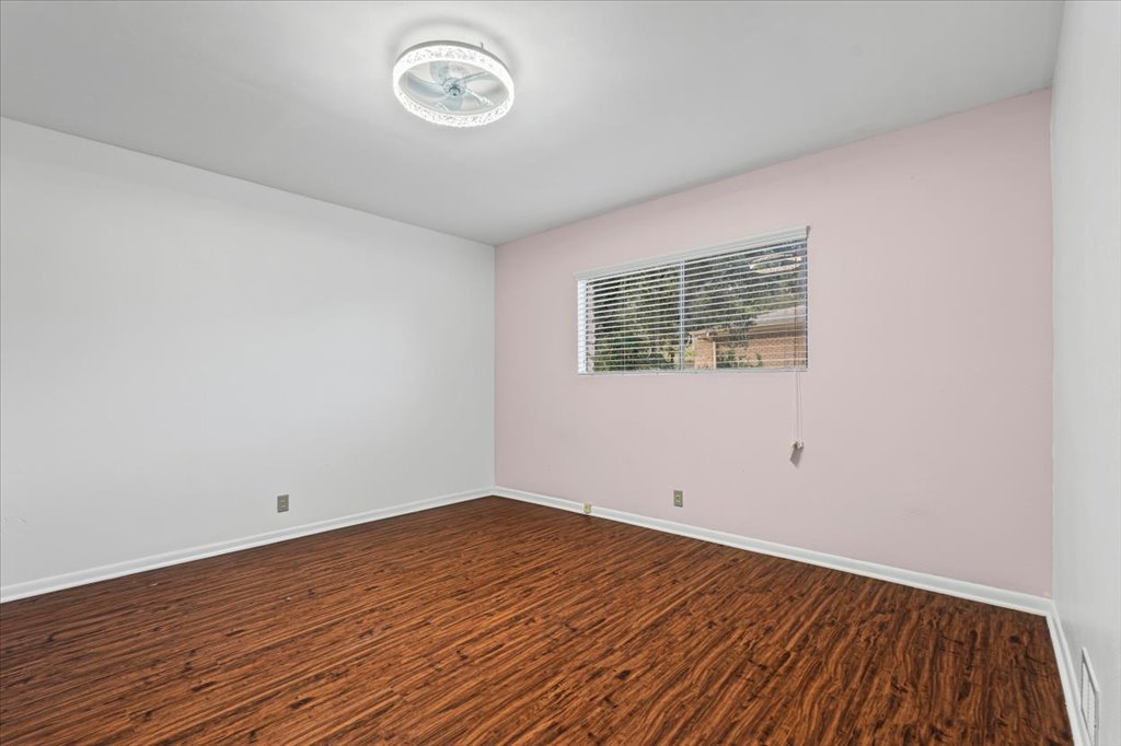 313 Comet Lakeway, TX 78734 - Photo 11 of 17 Secondary room featuring wood finished floors and baseboards