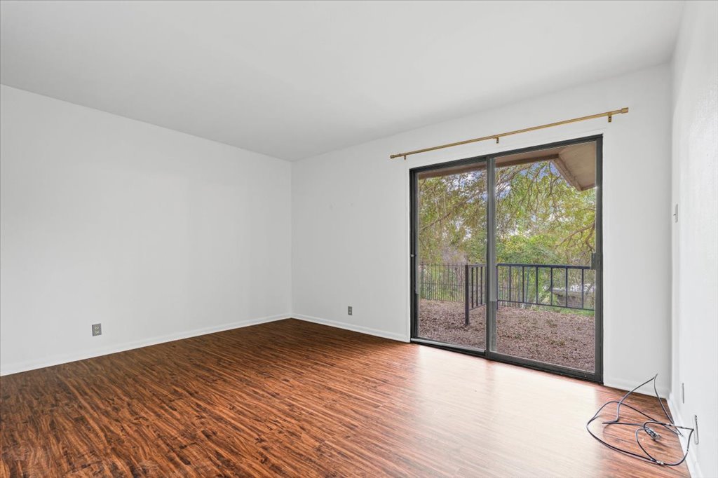 313 Comet Lakeway, TX 78734 - Photo 9 of 17 Secondary room with wood-style floors and baseboards