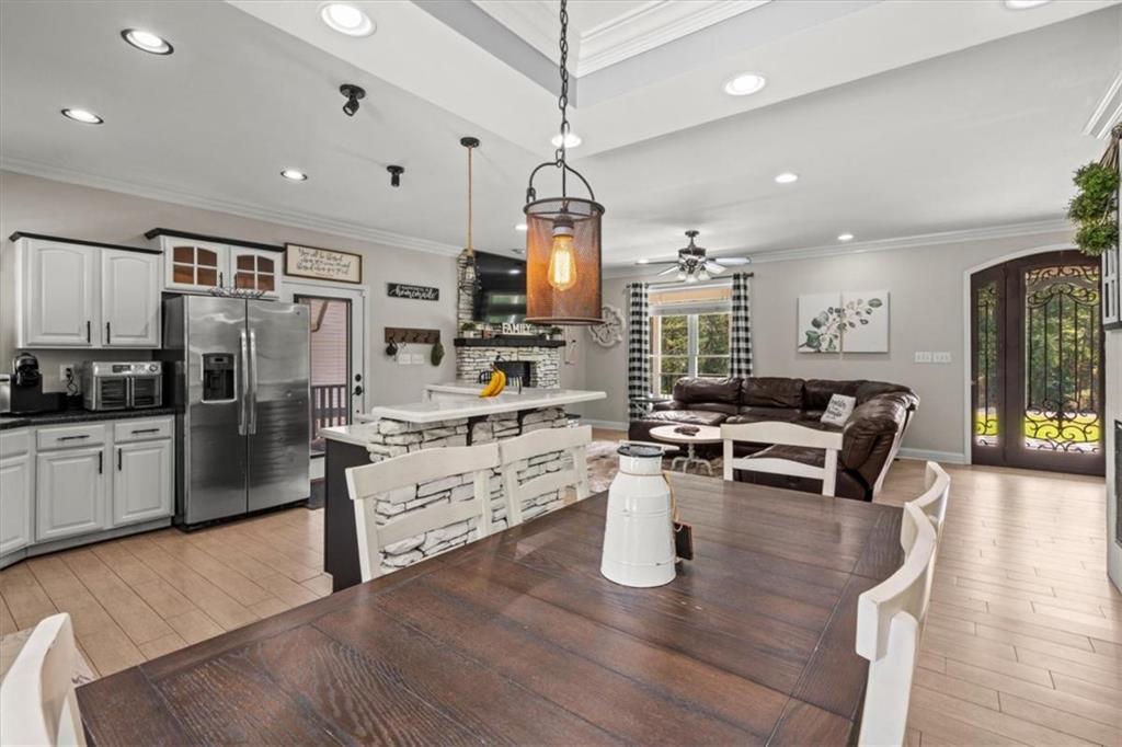 3002 Highway 101 Rockmart, GA 30153 - Photo 21 of 78 a kitchen with stainless steel appliances granite countertop a stove refrigerator and cabinets