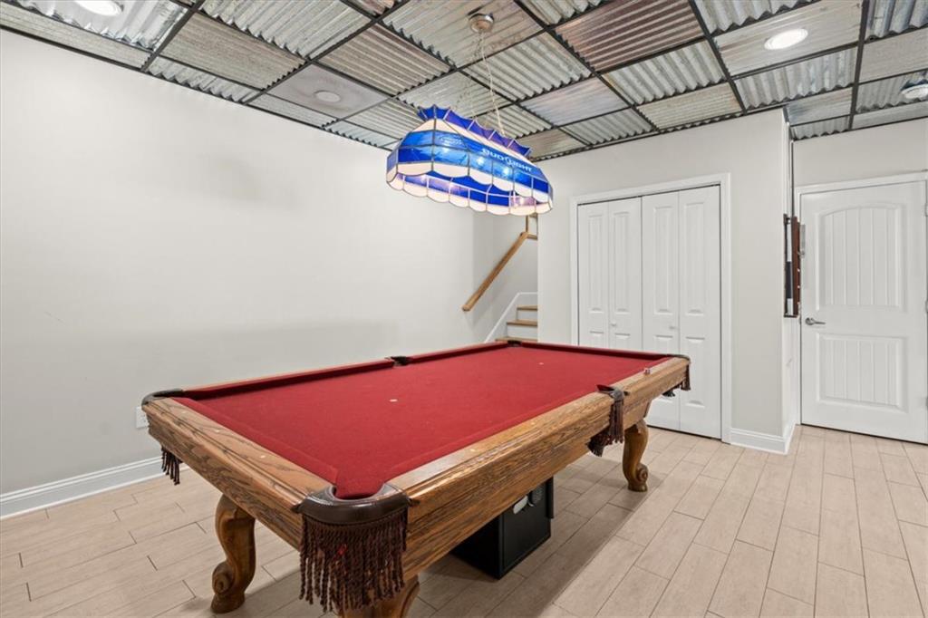 3002 Highway 101 Rockmart, GA 30153 - Photo 42 of 78 a room with pool table and wooden floor