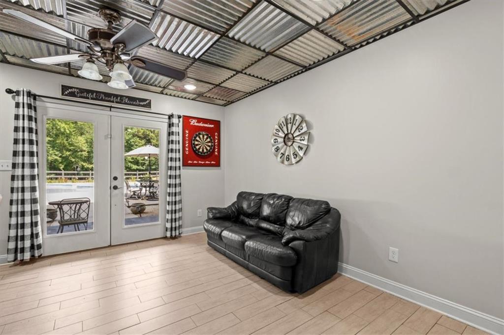 3002 Highway 101 Rockmart, GA 30153 - Photo 43 of 78 a living room with furniture and a flat screen tv