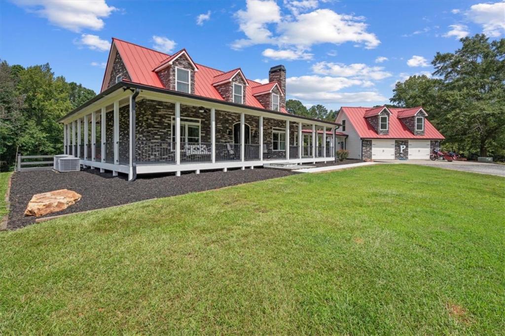 3002 Highway 101 Rockmart, GA 30153 - Photo 5 of 78 a view of an house with backyard space and balcony