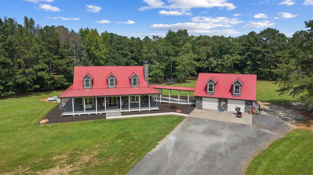 3002 Highway 101 Rockmart, GA 30153 - Photo 7 of 78 a view of a yard with a patio