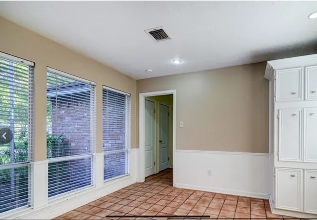 a view of an entryway with a workspace