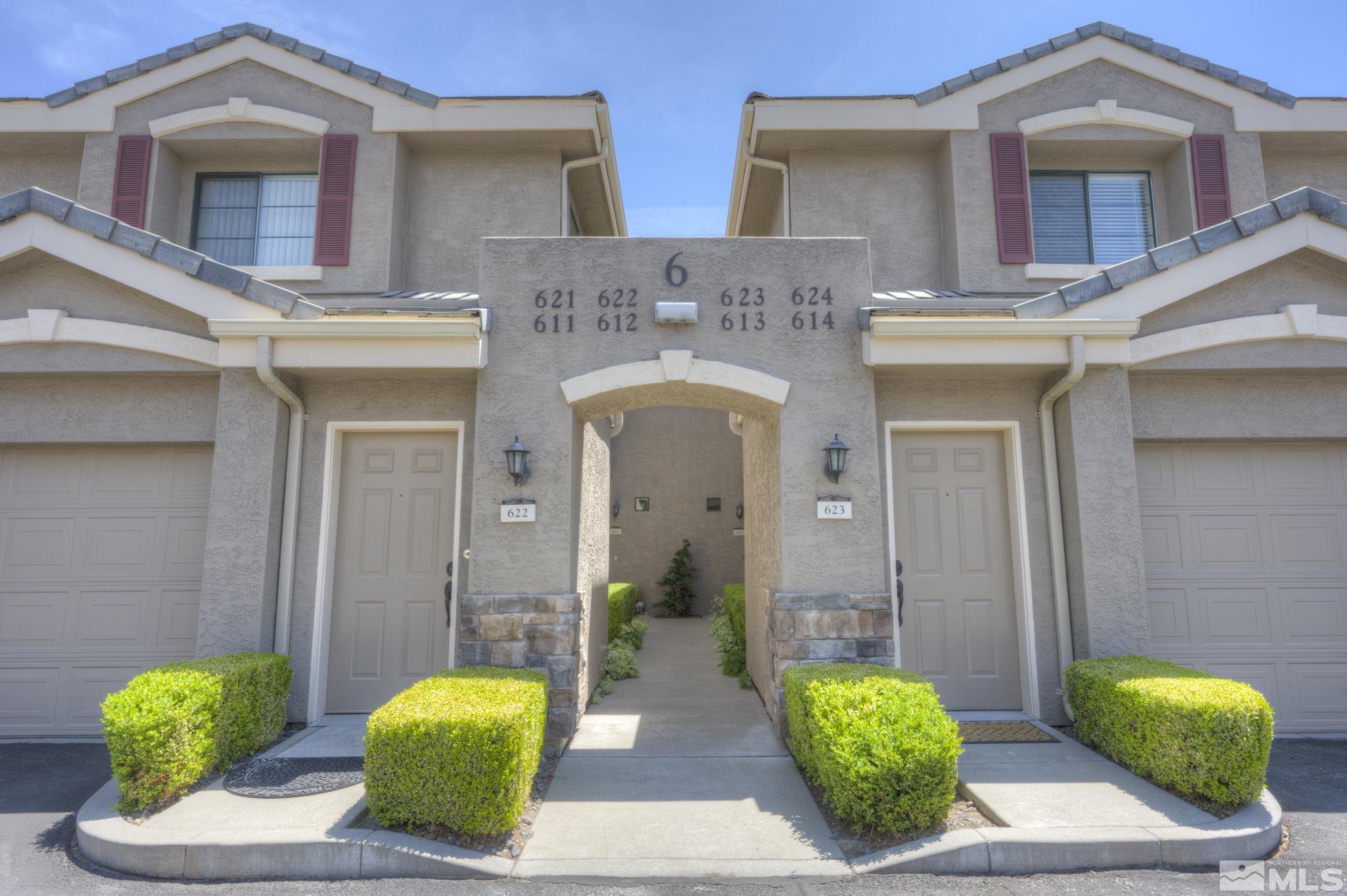 900 S Meadows, Unit 613 Reno, NV 89521 - Photo 1 of 40 a view of front door of house with potted plant