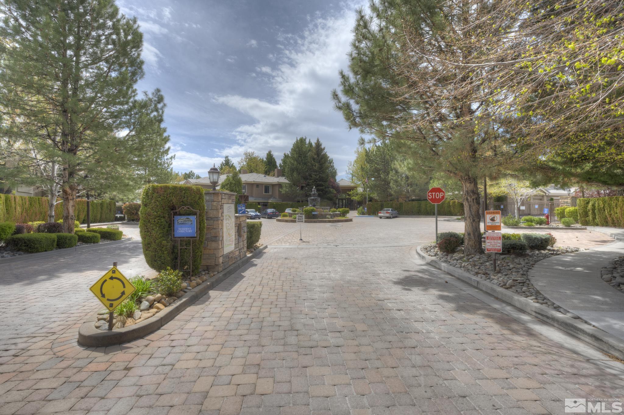 900 S Meadows, Unit 613 Reno, NV 89521 - Photo 23 of 40 a view of a street with fire pit