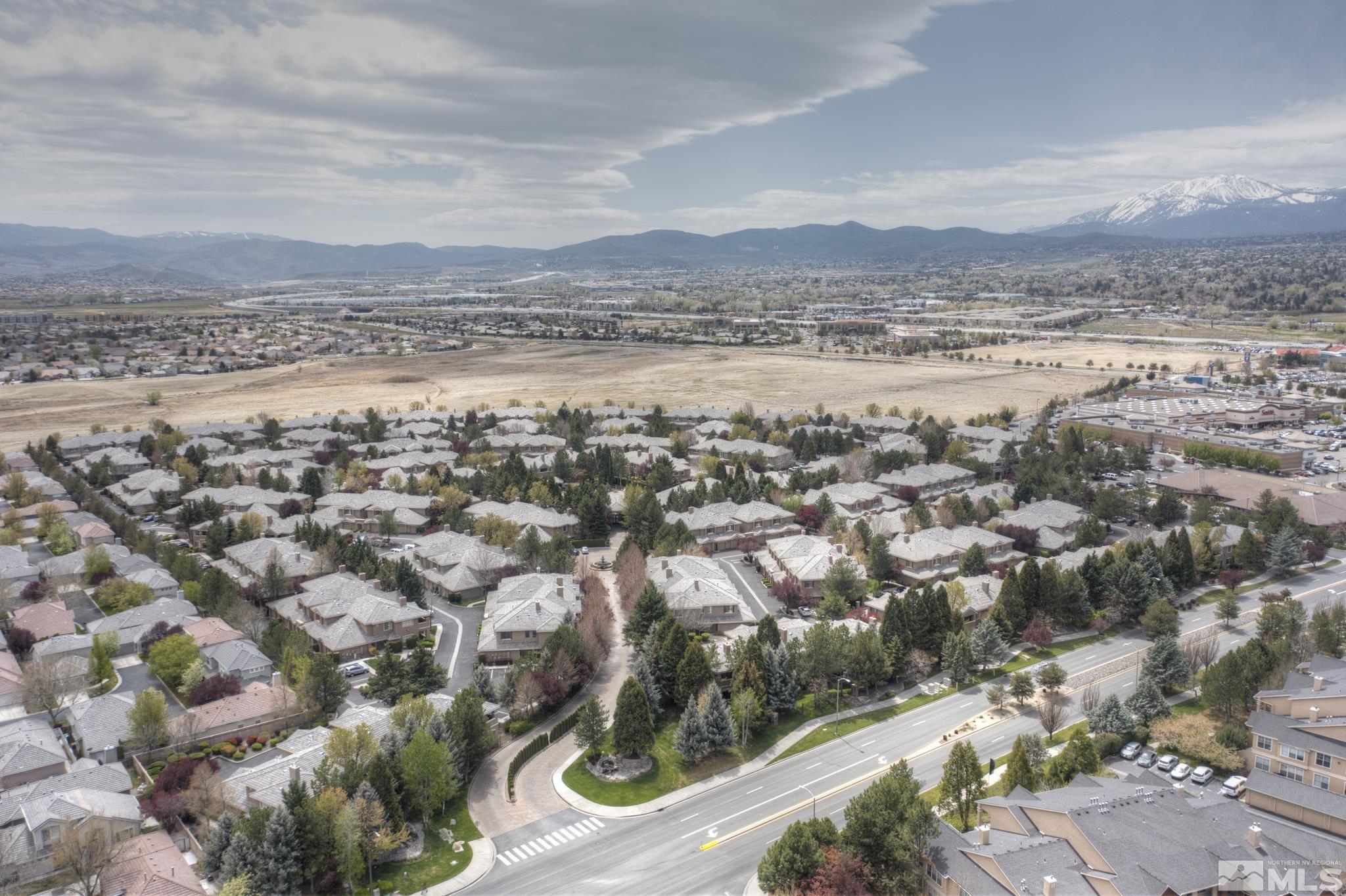 900 S Meadows, Unit 613 Reno, NV 89521 - Photo 33 of 40 an aerial view of residential houses with outdoor space