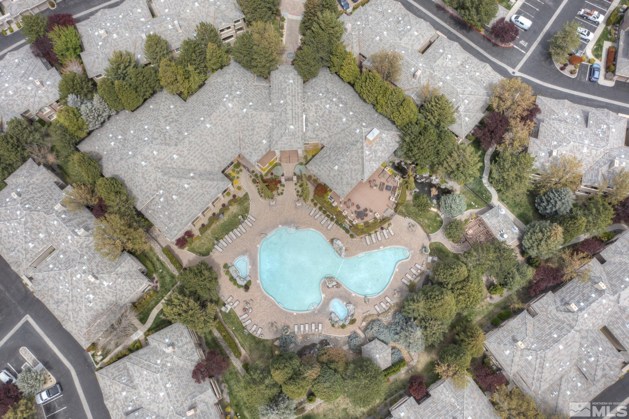 900 S Meadows, Unit 613 Reno, NV 89521 - Photo 36 of 40 an aerial view of a house with a yard and trees