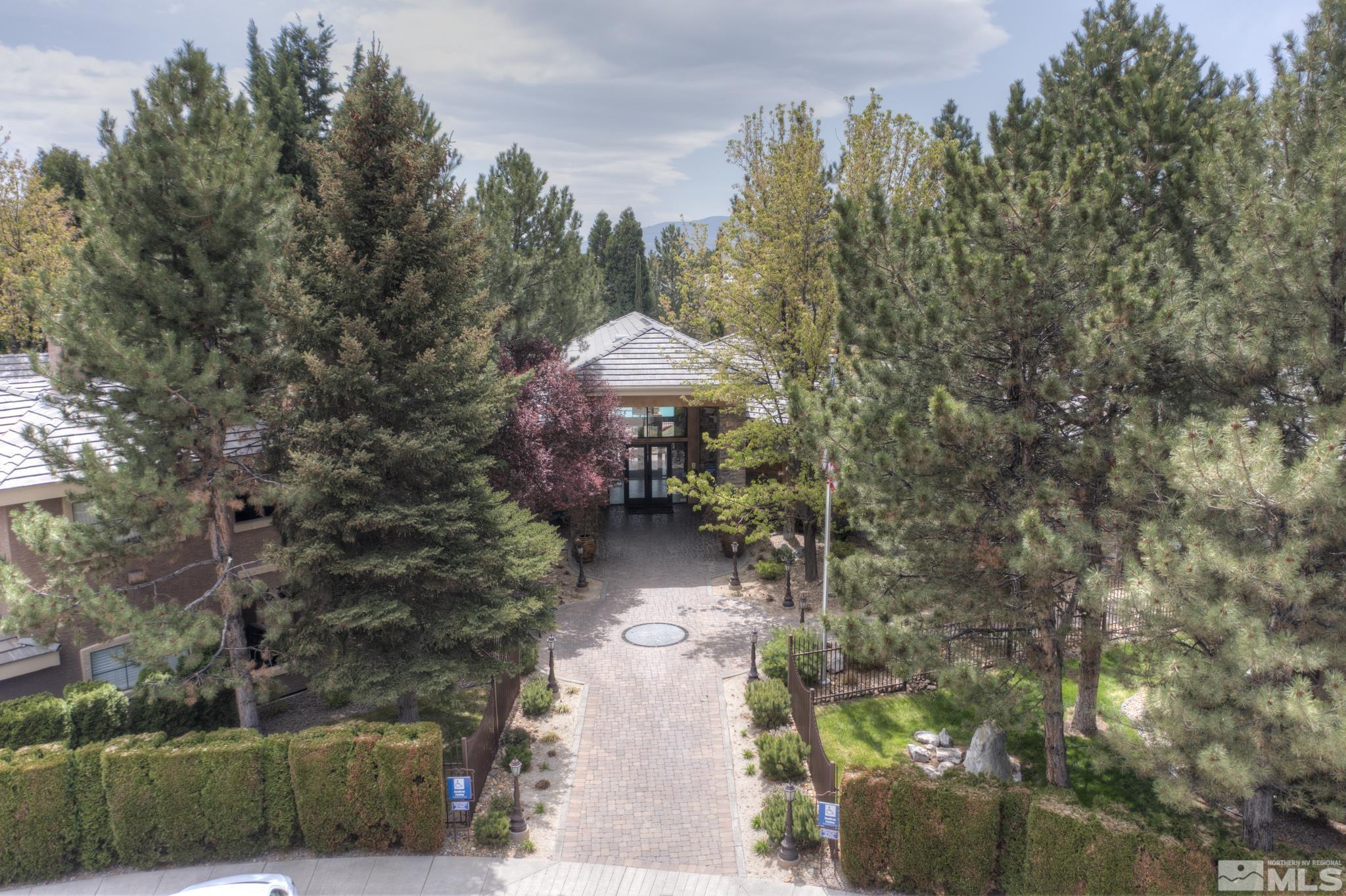 900 S Meadows, Unit 613 Reno, NV 89521 - Photo 38 of 40 a pathway of a house with a yard