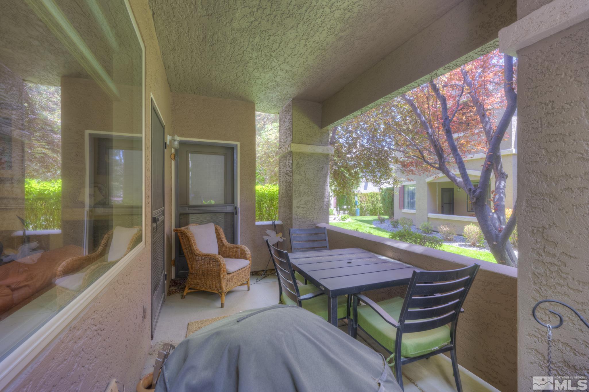 900 S Meadows, Unit 613 Reno, NV 89521 - Photo 40 of 40 a view of a house with backyard and sitting area