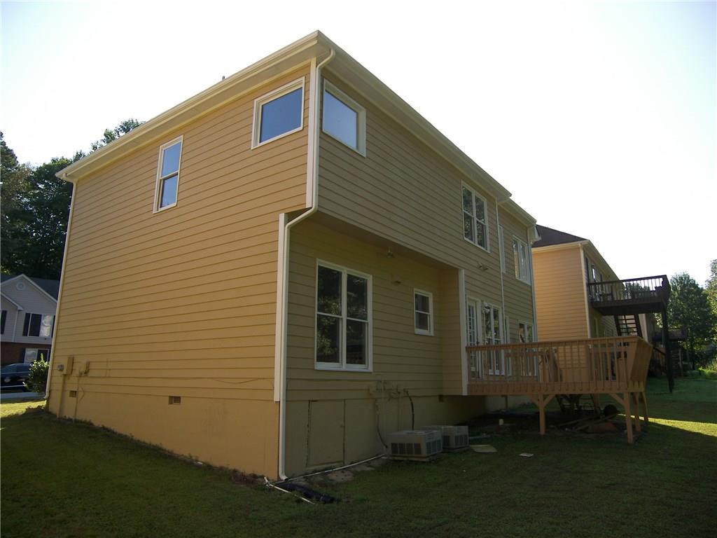 514 Rams Court Tucker, GA 30084 - Photo 12 of 14 a front view of a house with garden