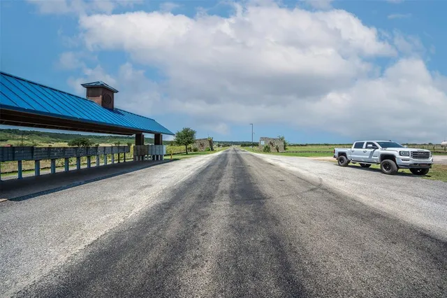 a view of an outdoor space with lounge chair
