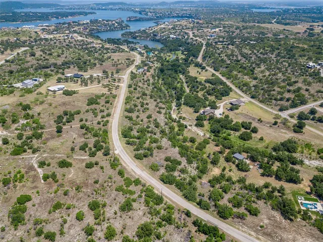 an aerial view of mountain with trees
