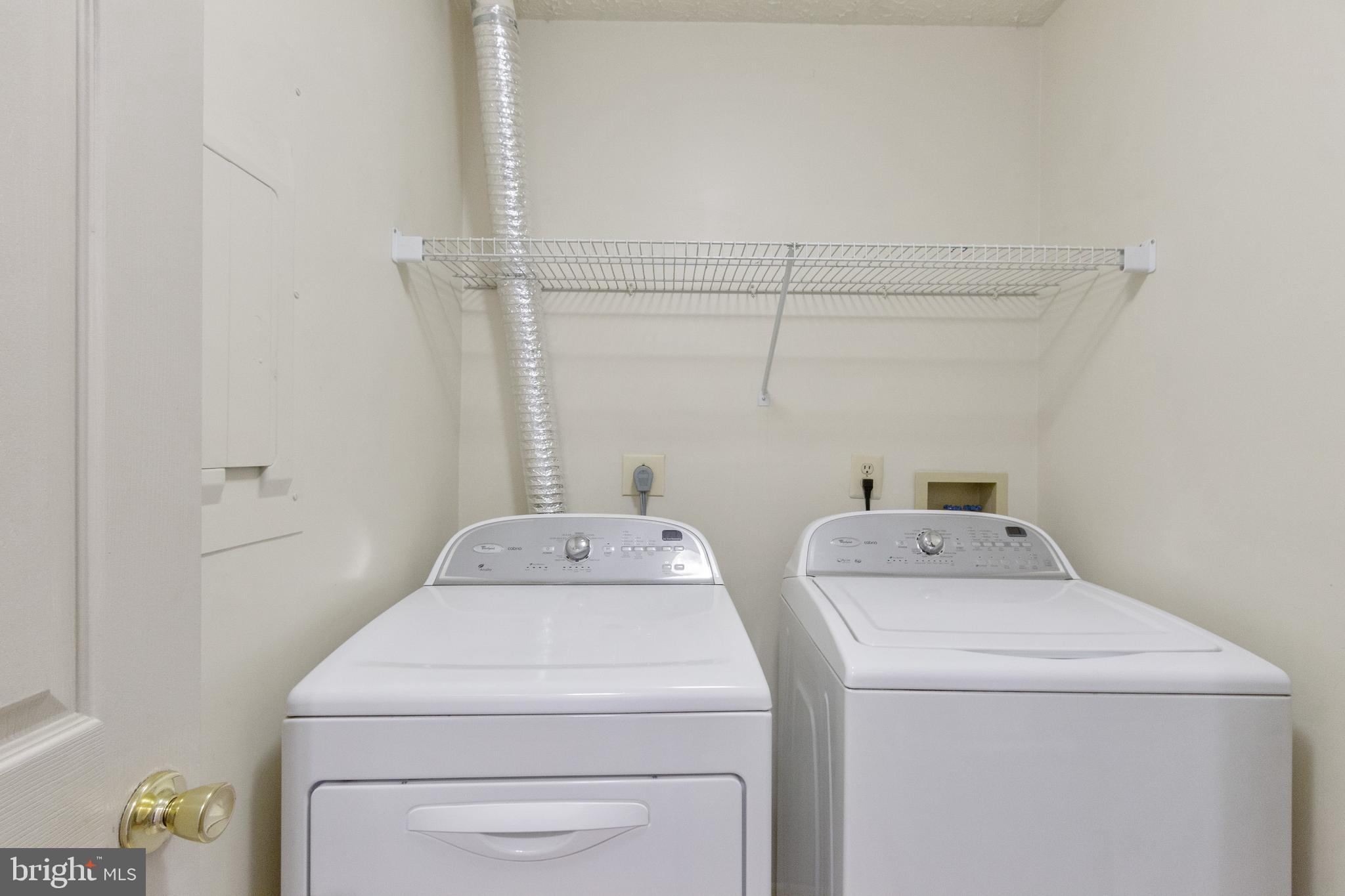 96 Jumpers Circle, Unit 216 Baltimore, MD 21236 - Photo 13 of 29 a utility room with dryer and washer