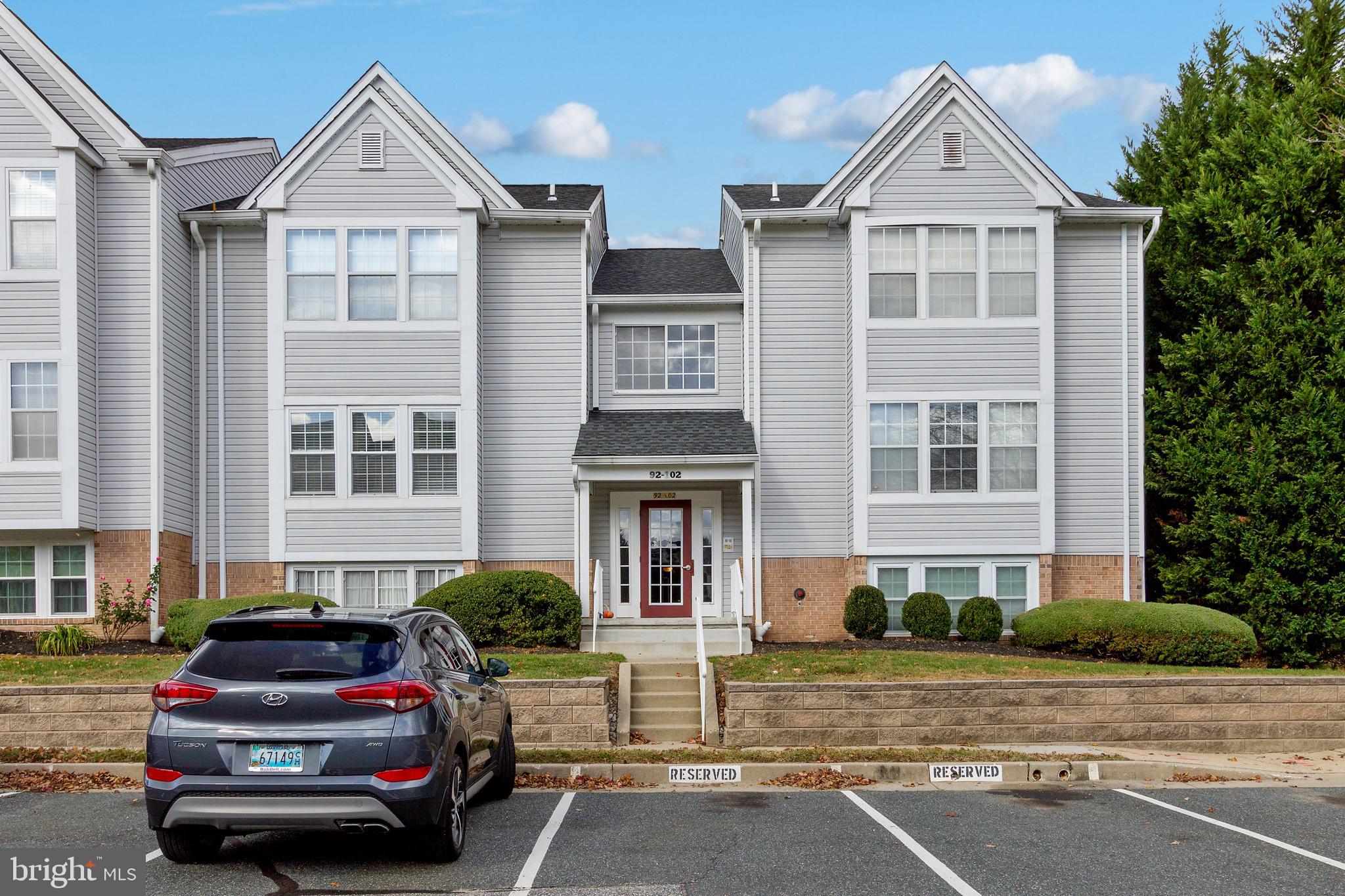 96 Jumpers Circle, Unit 216 Baltimore, MD 21236 - Photo 21 of 29 a car parked in front of a house