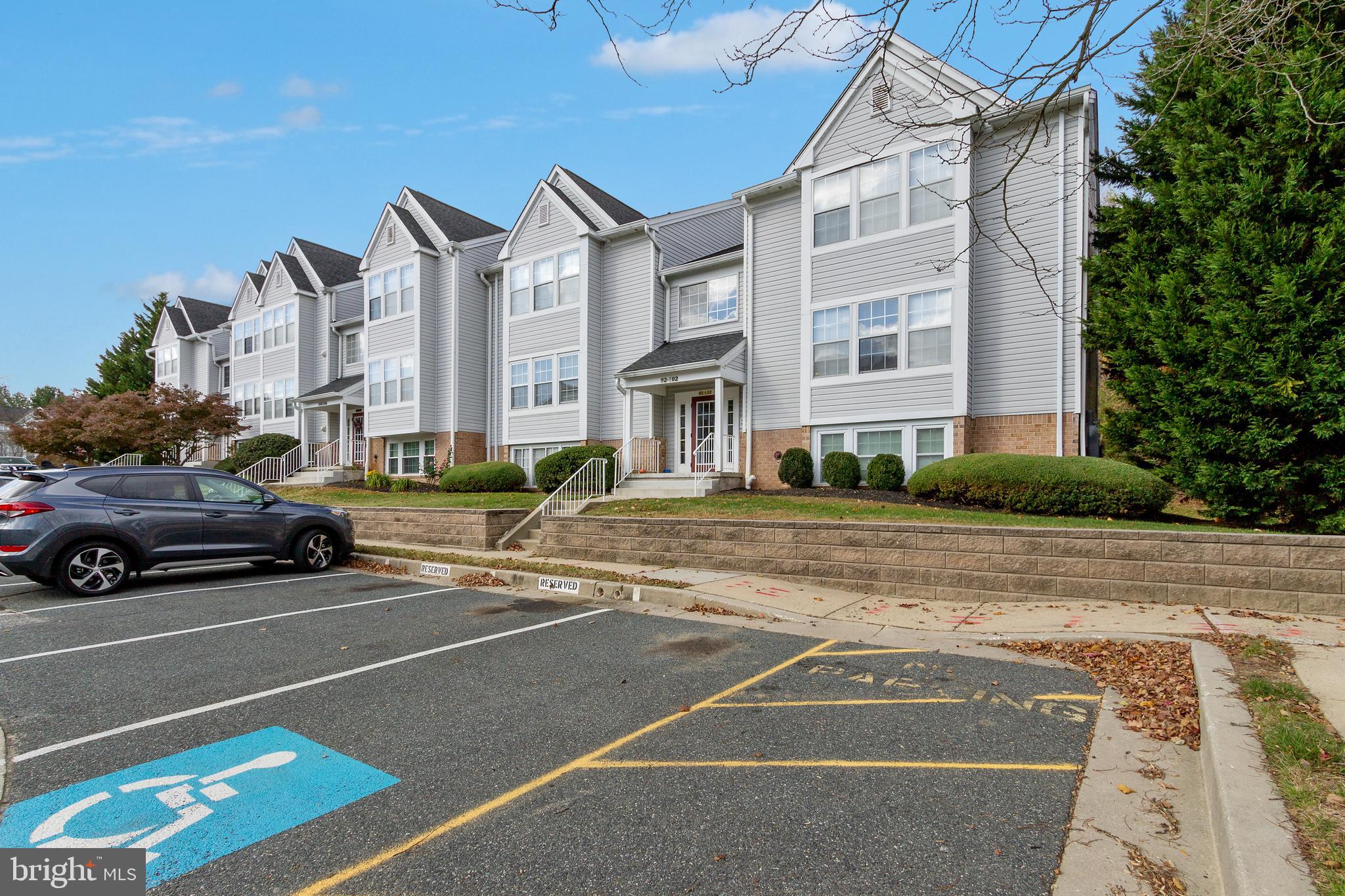 96 Jumpers Circle, Unit 216 Baltimore, MD 21236 - Photo 23 of 29 a view of a parked cars in front of a building