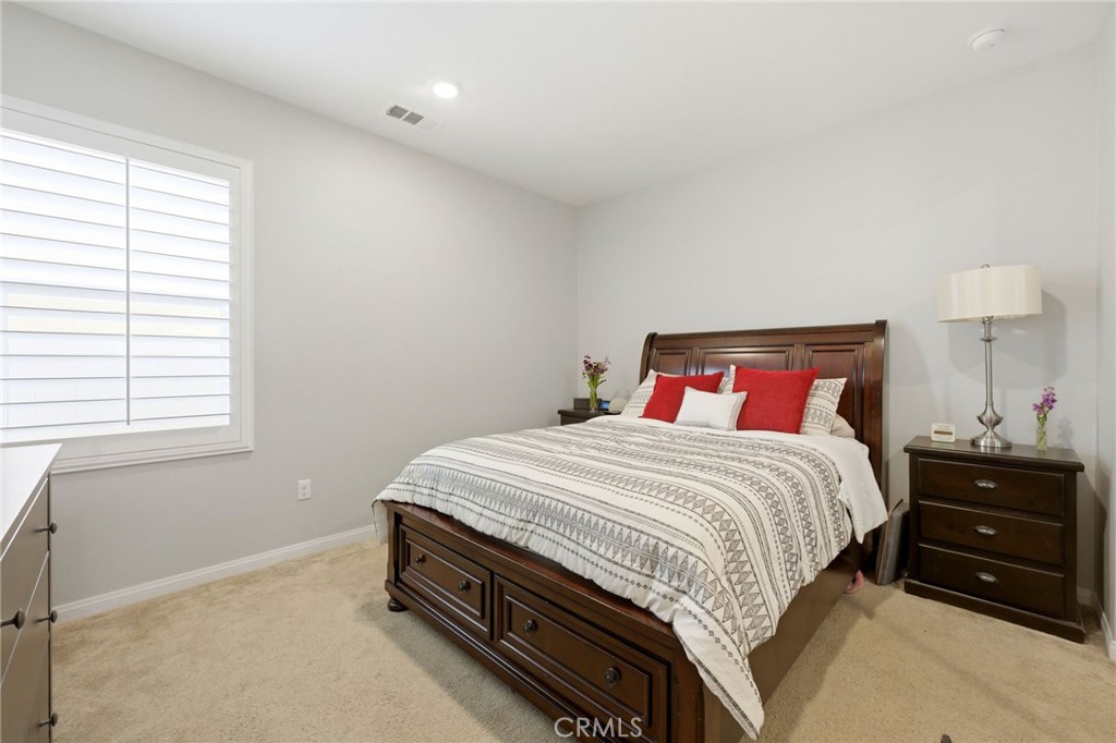 20948 Center Street Riverside, CA 92507 - Photo 58 of 92 a bedroom with a bed and a window
