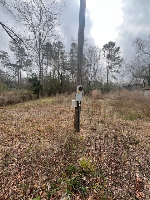 48 Magnolia Road New Caney, TX 77357 - Photo 4 of 12 a large body of water with a tree in the background