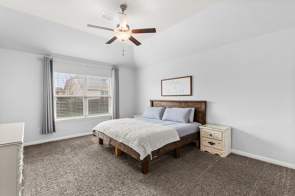 10237 Omni Drive Waco, TX 76708 - Photo 31 of 40 a bedroom with a bed and a window