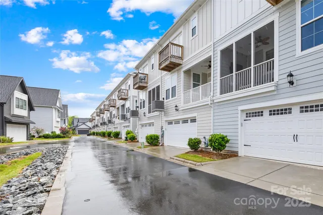 a view of a street with a building in the background